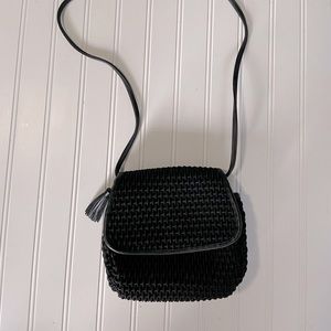 Dillards ladies small black purse with snap closure, inside zipper pocket